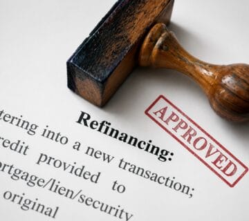 Mortgage refinance documents and property paperwork in Canada