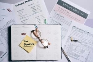 Planner and tax documents on a desk